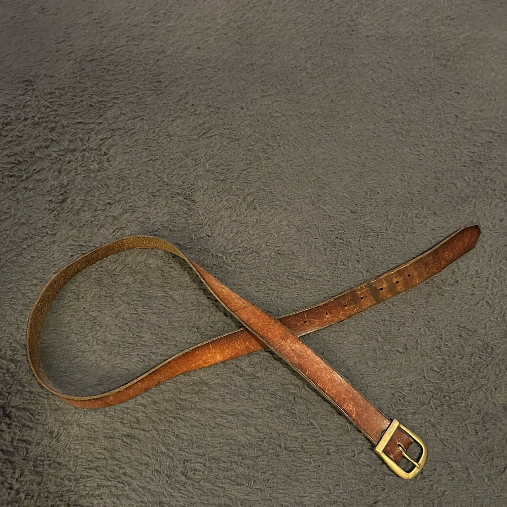 Genuine leather brown belt measures 45” unbranded